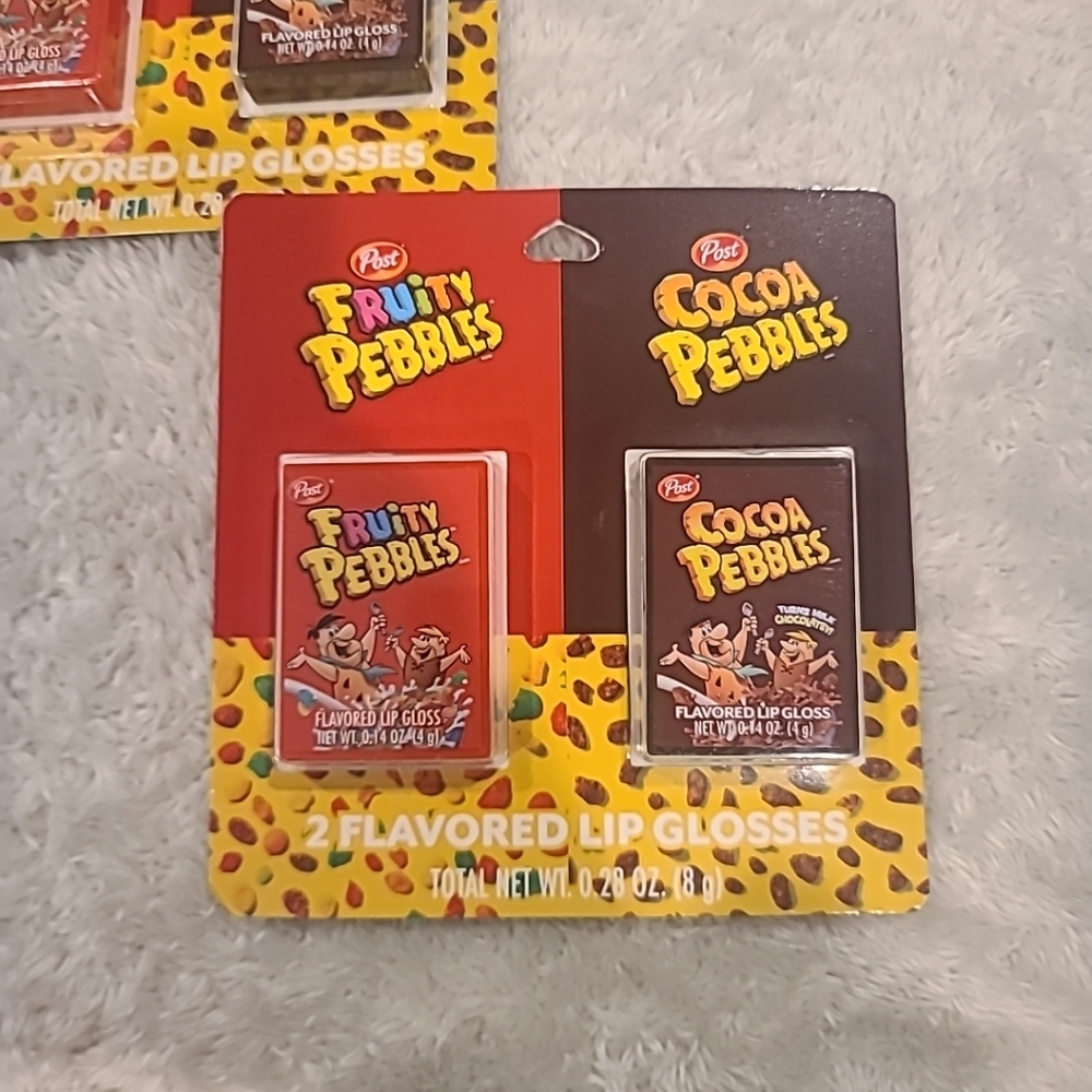 Fruity Pebbles 2 flavored lip glosses